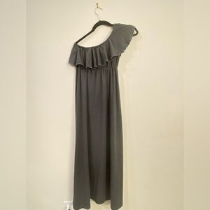 Long one shoulder dress.